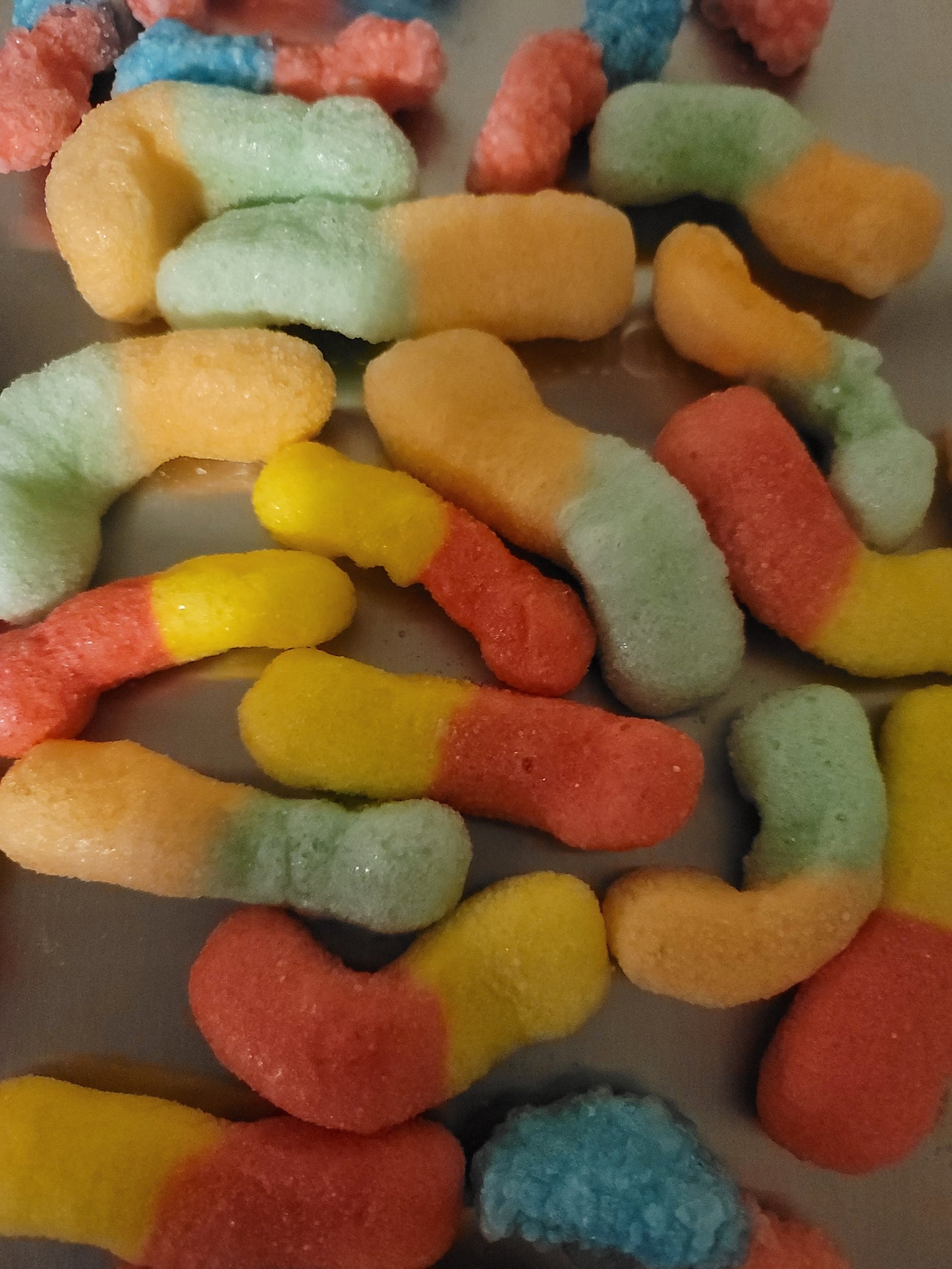 Sour worm puffs